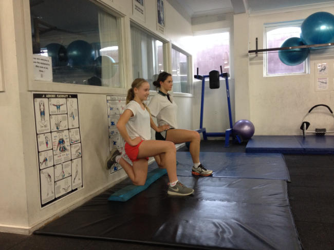 Sarah and her sister demonstrating the rec-fem stretch